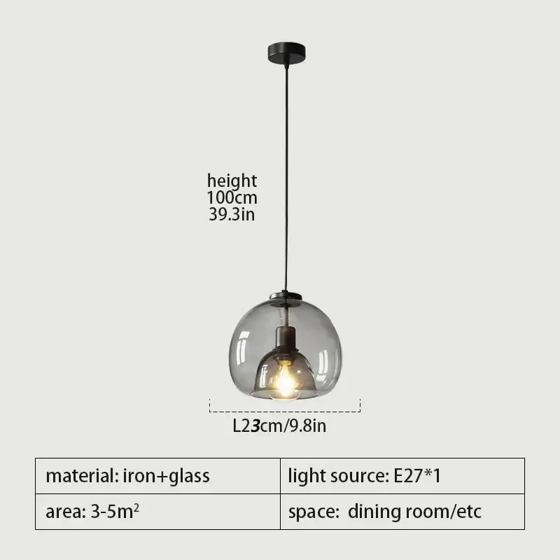 Modern pendant lights trio with smoked glass spherical shades and iron fixtures for dining room table lighting