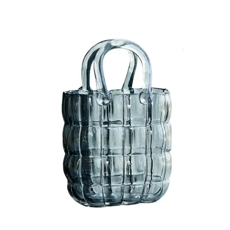 Transparent blue tinted glass tote bag with quilted pattern and curved handles for decorbites clear glass vase decor