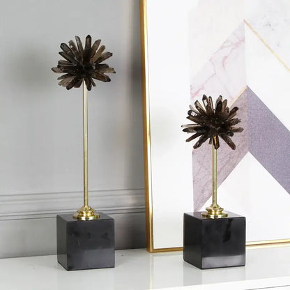 Two dark smoky quartz crystal handicraft artificial flower sculptures on brass stems with black marble bases for home decor