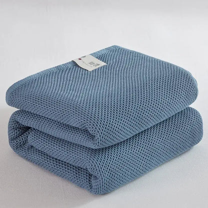 Soft beige cotton honeycomb towel blanket with textured woven pattern ideal for living room couch decorbites cotton honeycomb