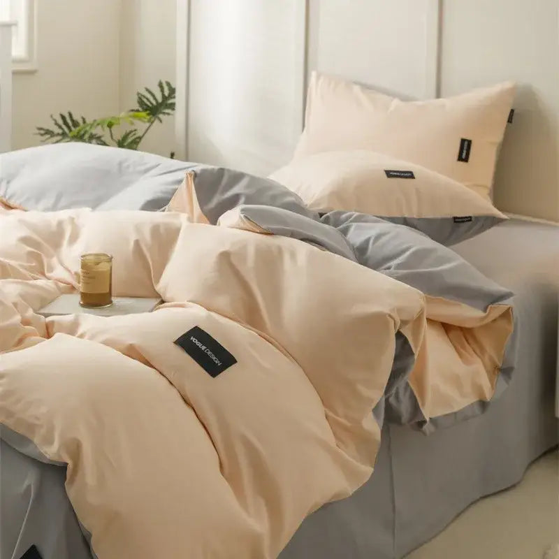 Beige and gray two-tone decorbites cotton bedding set with soft smooth fabric and black woven labels for bedroom use