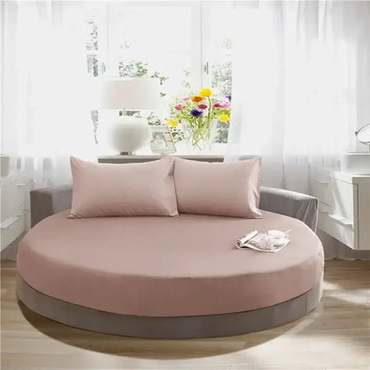 Soft dark gray cotton round bed sheet set with a soft pink fabric cotton round bed and matching pillows by decorbites