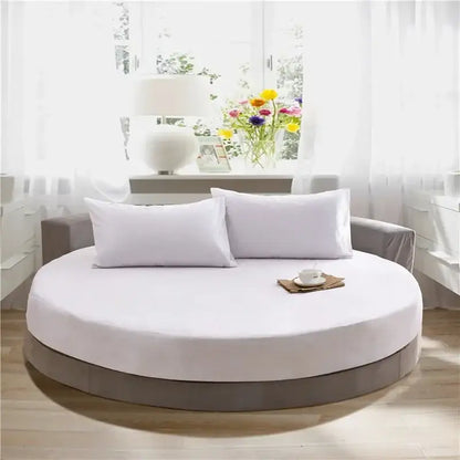 Soft dark gray cotton round bed sheet set on round bed with white mattress and matching pillows for decorbites cotton round use