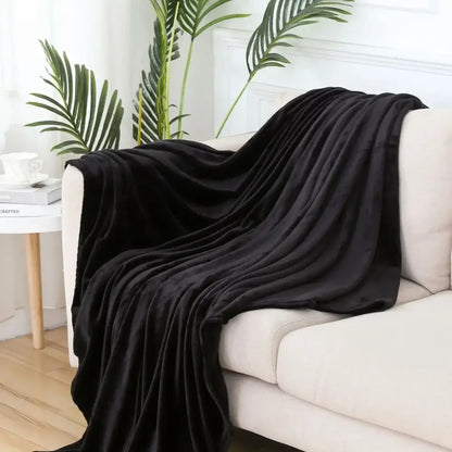 Soft gray cozy flannel plush throw blanket draped on sofa for decorbites cozy flannel warm bedroom decor