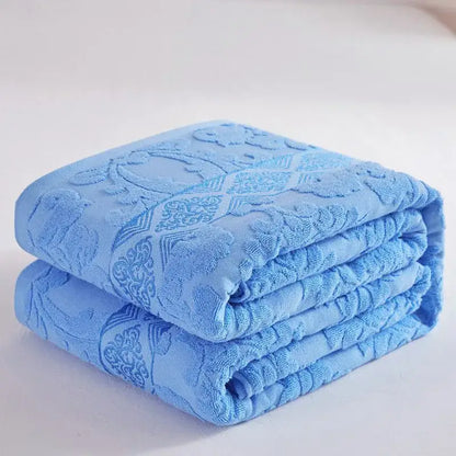 Soft pastel light blue decorbites cotton jacquard towel blanket with raised floral geometric pattern for bedroom and sofa decor