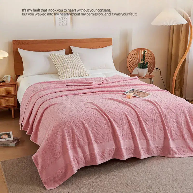 Soft pink cotton jacquard towel blanket with subtle diamond texture ideal as decorbites jacquard decor or sofa cover