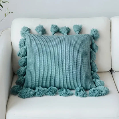 Teal ribbed knit cushion cover with soft tassels ideal as a decorbites knit cushion for living room decor