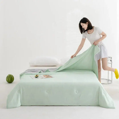 Mint green quilted summer quilt made with decorbites cool fibre ideal for cool fibre summer bedroom decor