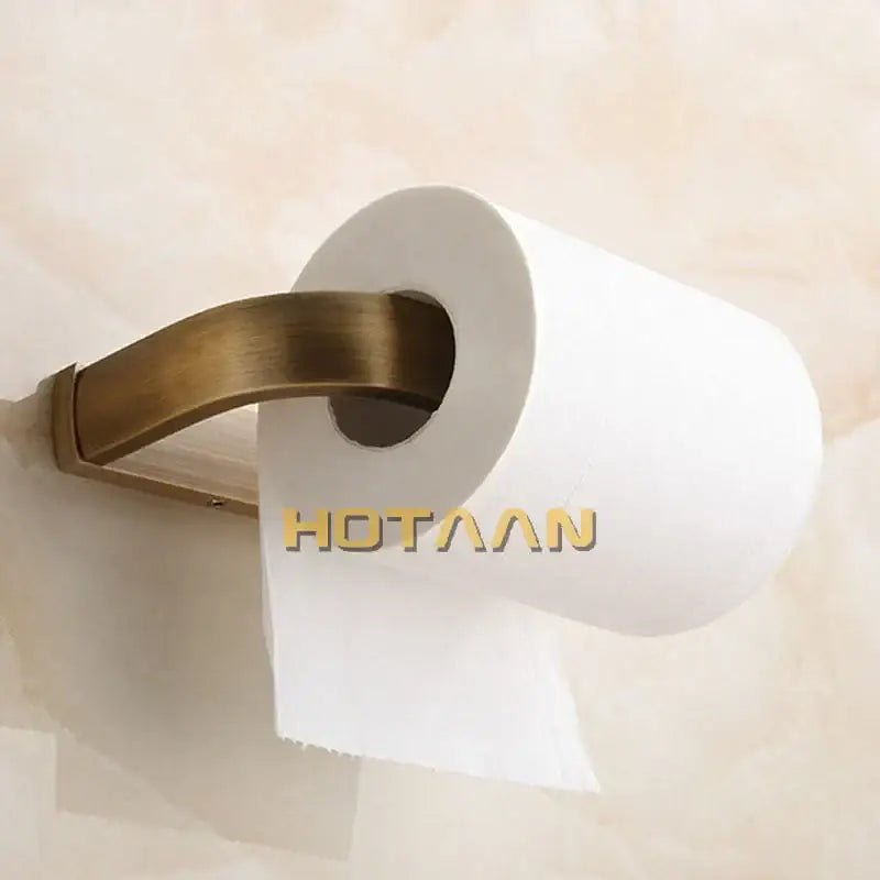 Solid brass finish toilet paper holder with white tissue paper roll for bathroom accessory with brass finish