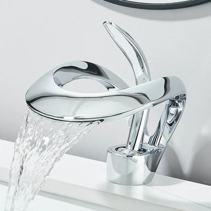Chrome finished solid brass single hole waterfall basin faucet with sleek modern design for cold water bathroom sink