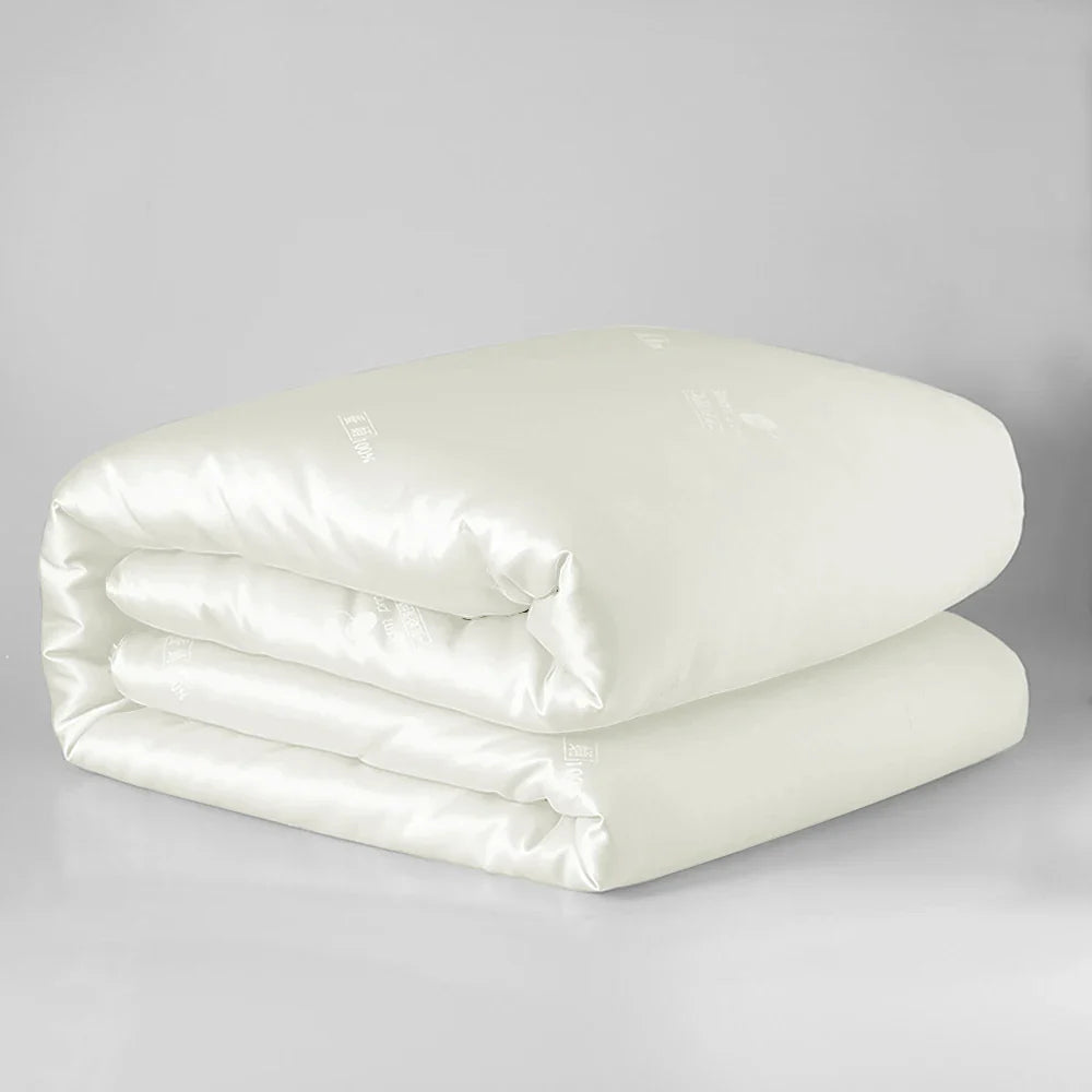Sondeson luxury natural 100% silk quilt in off-white satin with subtle quilted stitching for soft comfort