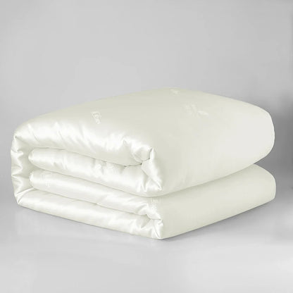 Sondeson luxury natural 100% silk quilt in off-white satin with subtle quilted stitching for soft comfort