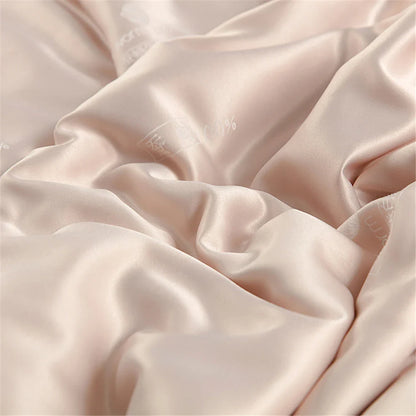 Sondeson luxury natural 100 percent silk quilt in blush pink satin with delicate embroidery for soft comfort