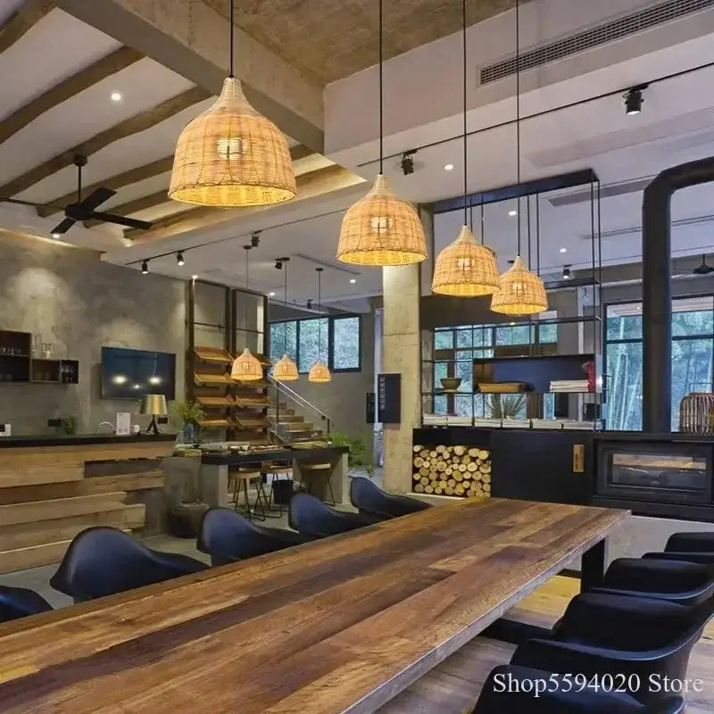 Southeast asia natural and dark brown woven pendant light with warm golden glow for dining room lighting