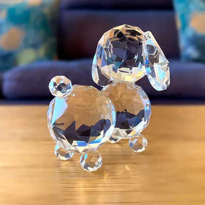 Sparkling clear crystal dog figurine with faceted transparent body and polished surfaces for bedroom decor
