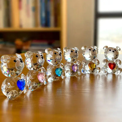 A row of decorbites crystal bear figurines each holding a colorful heart gemstone for bedroom decor