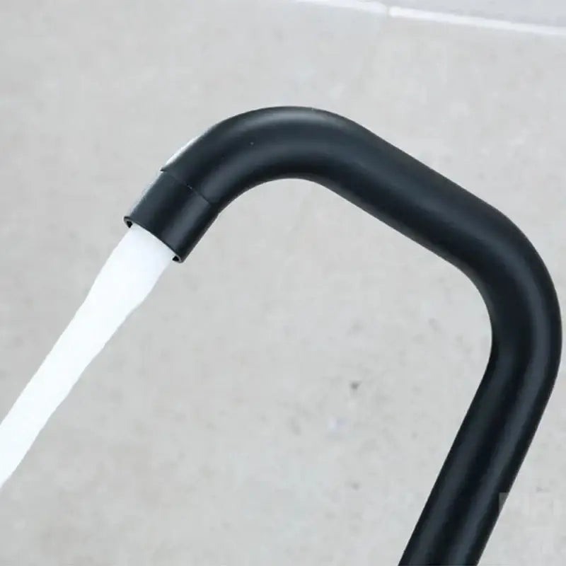 Decorbites™ black matte stainless steel rotating sink faucet with curved spout and flowing white water