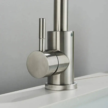 Modern brushed stainless steel rotating sink faucet by DecorBites™ with sleek cylindrical design and single lever handle