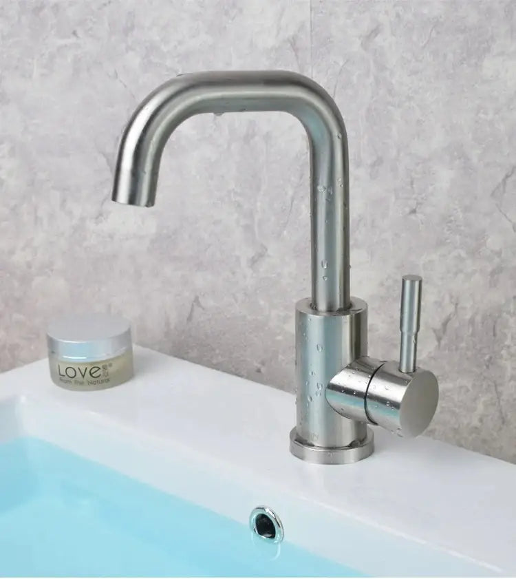 Modern brushed stainless steel rotating sink faucet with single curved spout and cylindrical handle by DecorBites™