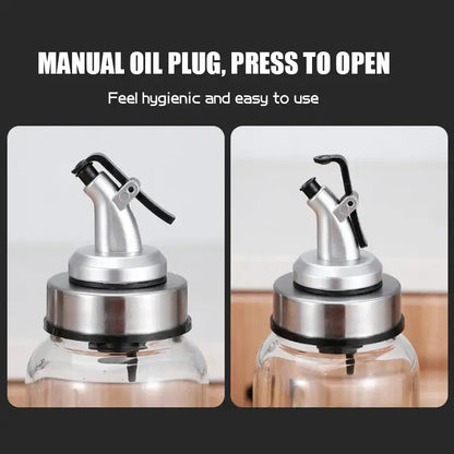 Stainless steel bottle cap stopper with colored handle and manual oil dispenser featuring a press-to-open spout and black seal