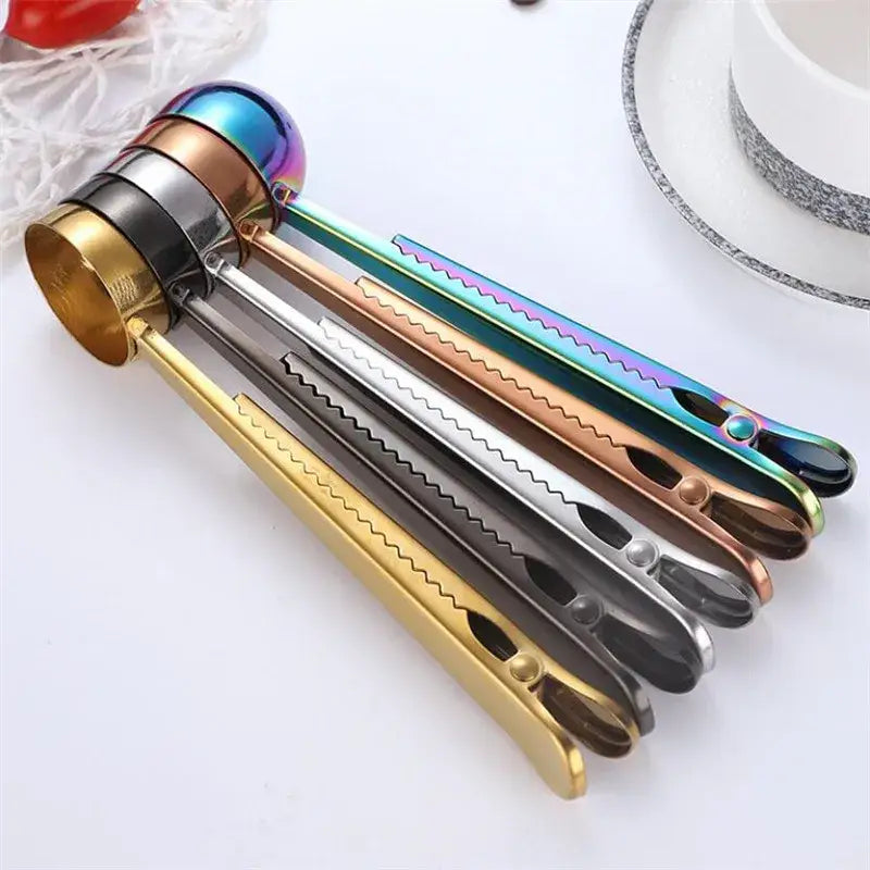 Set of five colorful stainless steel nutcrackers with iridescent finish and serrated handles for sealing clip use
