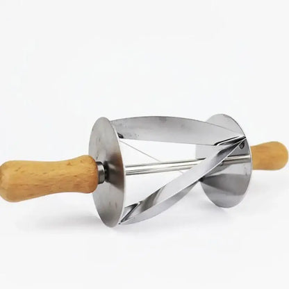 Stainless steel croissant dough cutter with light wood handles and spiral roller for easy dough cutting by decorbites