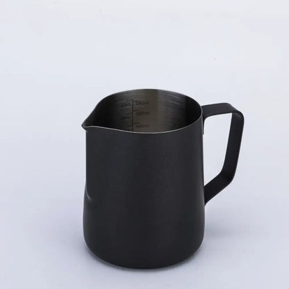 Black matte stainless steel milk frothing jug with interior measurement markings for precise milk frothing