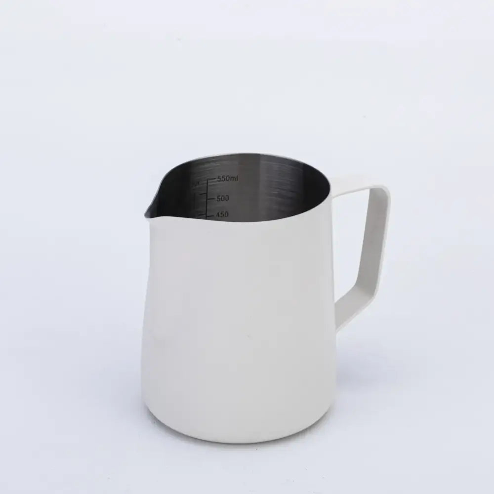 A sleek matte white stainless steel milk frothing jug with measurement markings for precise milk frothing use