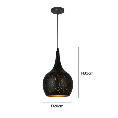 Black pendant light with speckled texture and amber-gold interior by decorbites black nordic for dining room decor