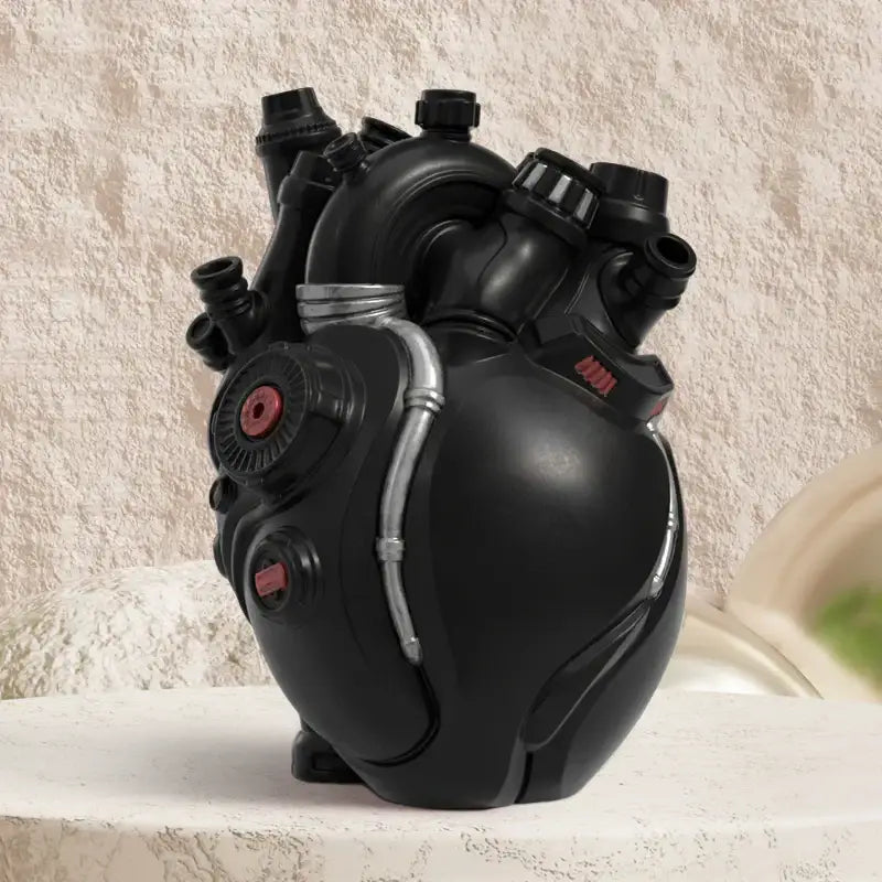 Black robotic heart cardiac vase with silver piping and red accents for decorbites heart cardiac living room decor