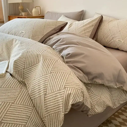 Beige and cream geometric patterned cotton duvet set with subtle woven texture featuring decorbites grid printed fitted sheet