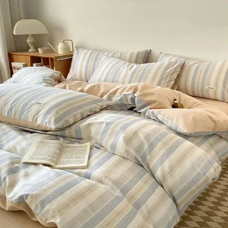 Striped beige and blue cotton bedding set with fitted sheet featuring cozy fabric and subtle vertical stripes decorbites grid printed