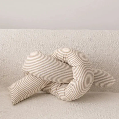 A soft cream-colored decorbites cloud star kids bedroom pillow with beige and white striped corduroy in star moon shape