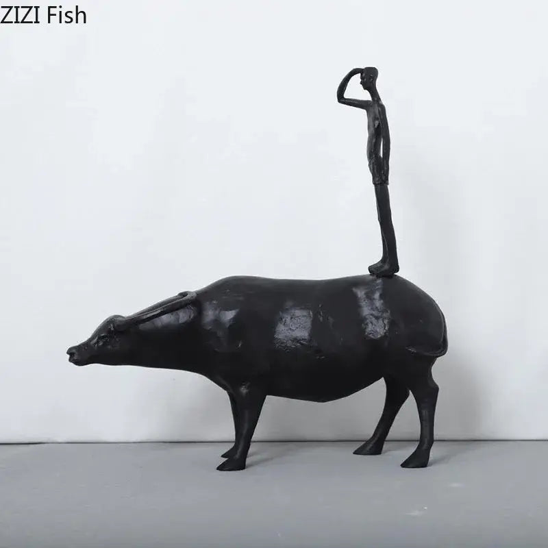 Stylized black matte metal cowherd shepherd boy sculpture standing atop a water buffalo for living room decorbites decor