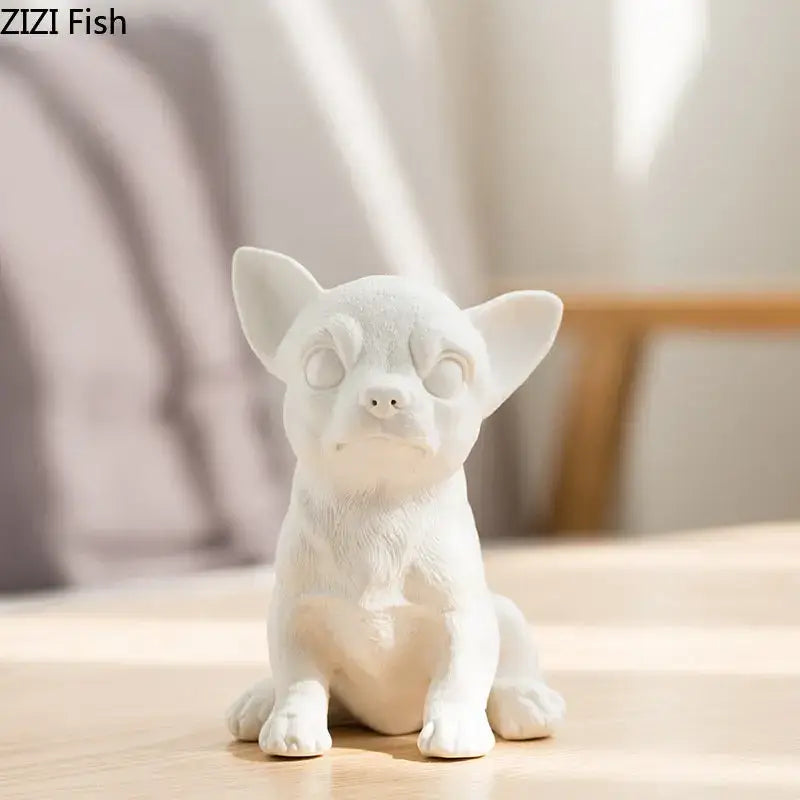 Stylized white matte ceramic sculpture of a sitting french bulldog miniature figurine for living room decor