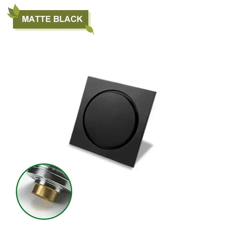 Matte black decorbites brass square shower floor drain with circular center and metallic brass fittings for kitchen and bathroom