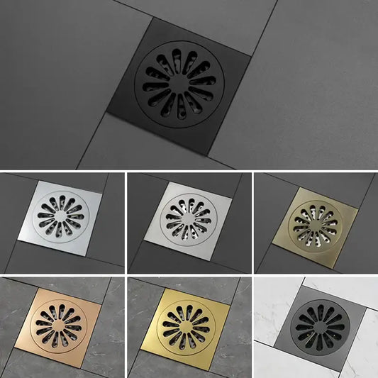 Sunburst brass square shower floor drain with radiating slots in brushed stainless steel polished chrome and gold tones