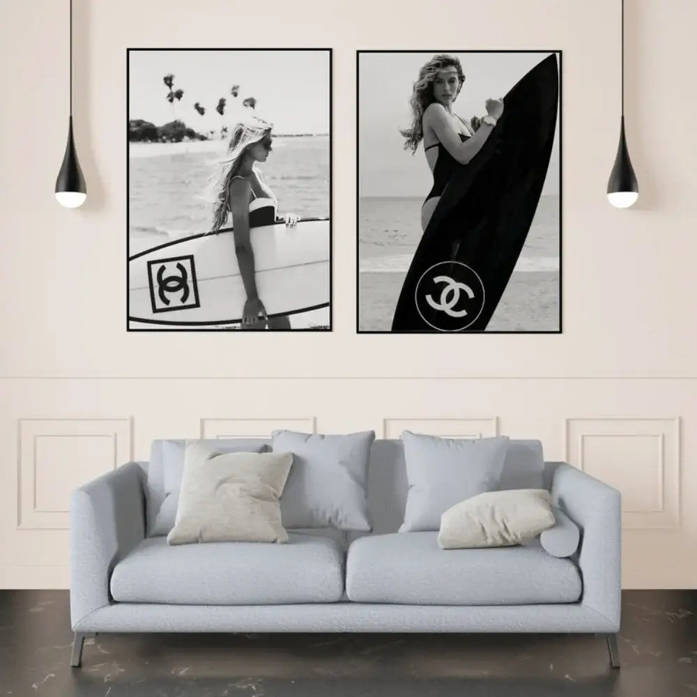 Black and white framed surfboard wall art featuring women with chanel logos for teen room decor by DecorBites