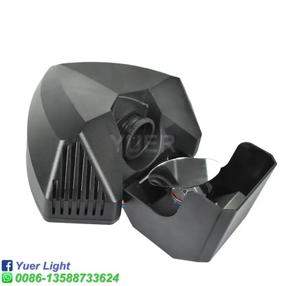 Tactical black and yellow disco gobo wizard beam living room light with a black plastic aquarium pump and visible internal components