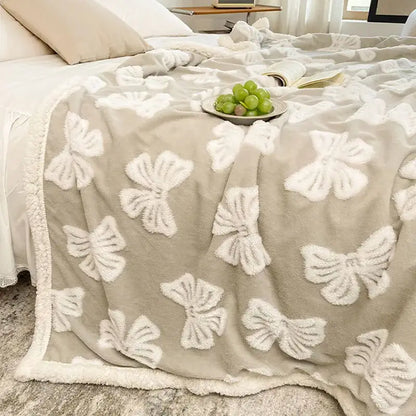 Taupe and white butterfly jacquard wool blanket with beige plush throw and soft fuzzy texture for cozy decorbites decor