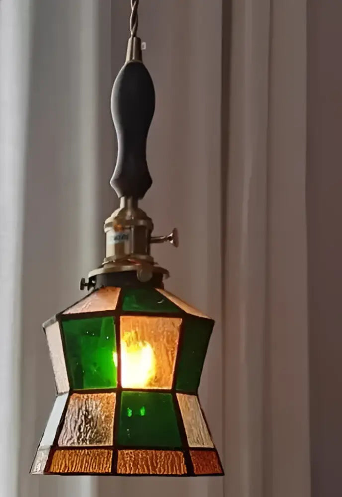 Green and amber stained glass pendant light with brass fixture and dark wooden handle for dining room decorbites blue glass