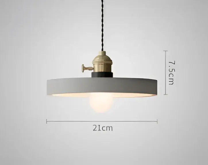 Gray minimalist pendant light with brass industrial fixture and exposed bulb complements decorbites blue glass pendant lights