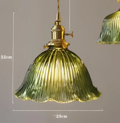 Teal blue glass pendant light with ribbed texture and brass hardware ideal for dining room pendant lights decorbites blue glass