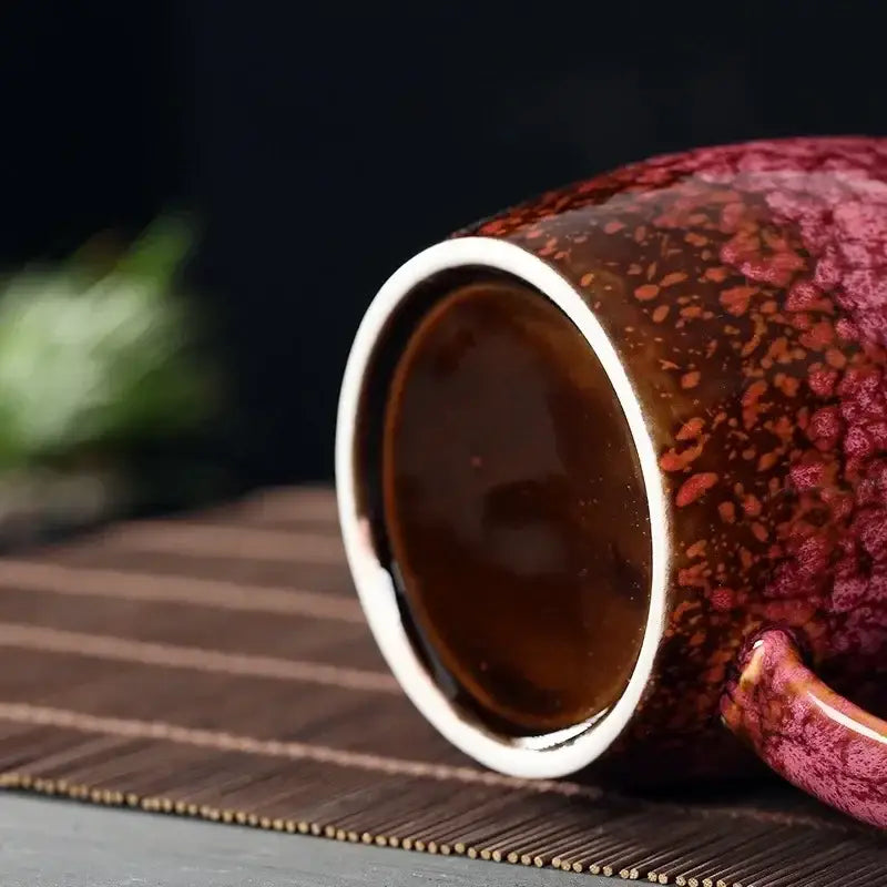 Teal and brown crackle glaze 480ml ceramic mug with speckled red and brown glaze and smooth white rim for coffee use
