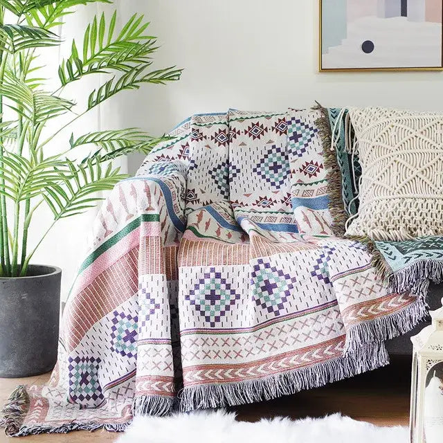 Cozy sofa blanket with dustproof butterfly carp pattern in muted beige teal and dusty rose with fringed edges for living room
