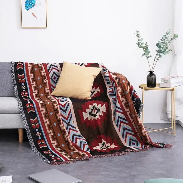 Cozy woven sofa blanket with bold dustproof butterfly carp pattern in red brown black and white with fringed edges