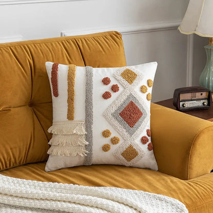 White throw pillow cover with terracotta and mustard geometric patterns, gray stripe, and fringe for decorbites boho tufted decor