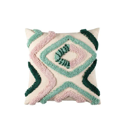 Cream-colored cushion case with soft pink and teal green decorbites geometric embroidery tassel pattern for living room decor