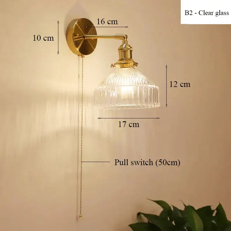 Vintage-style brass wall lamp with teal ribbed glass shade led and adjustable pull chain for luxury living room decor