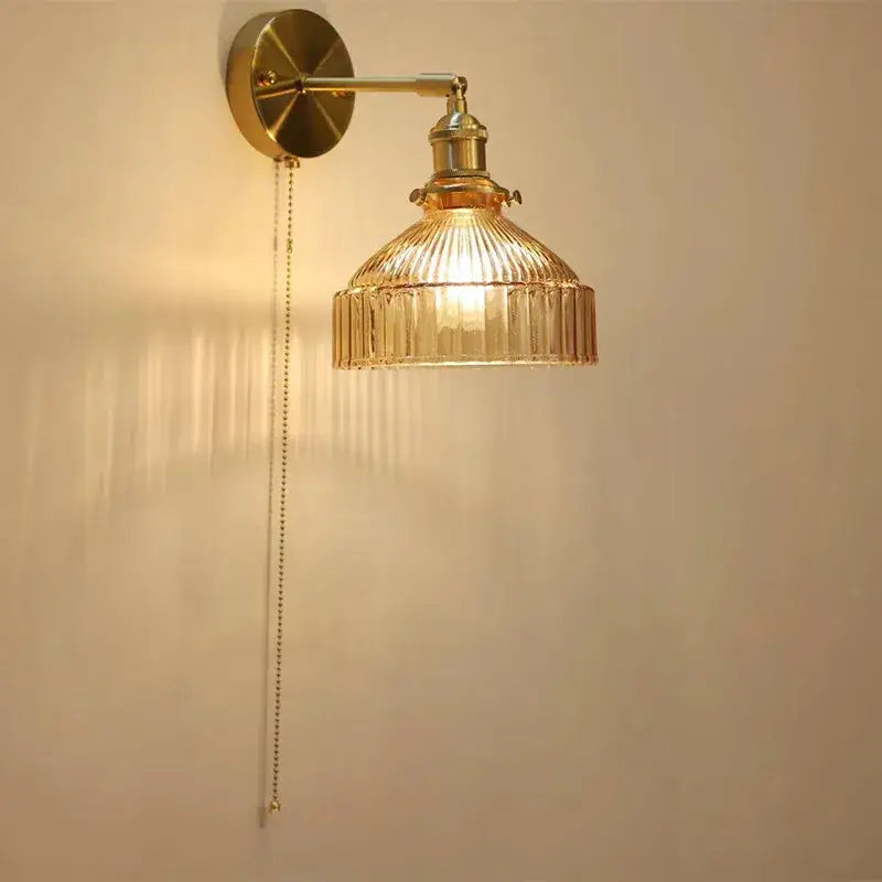Gold-toned wall lamp with adjustable arm and teal ribbed glass shade led for luxury living room decor